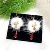 Elegant Santa Plum Blossom Earrings with Feather and Red Crystal Accents