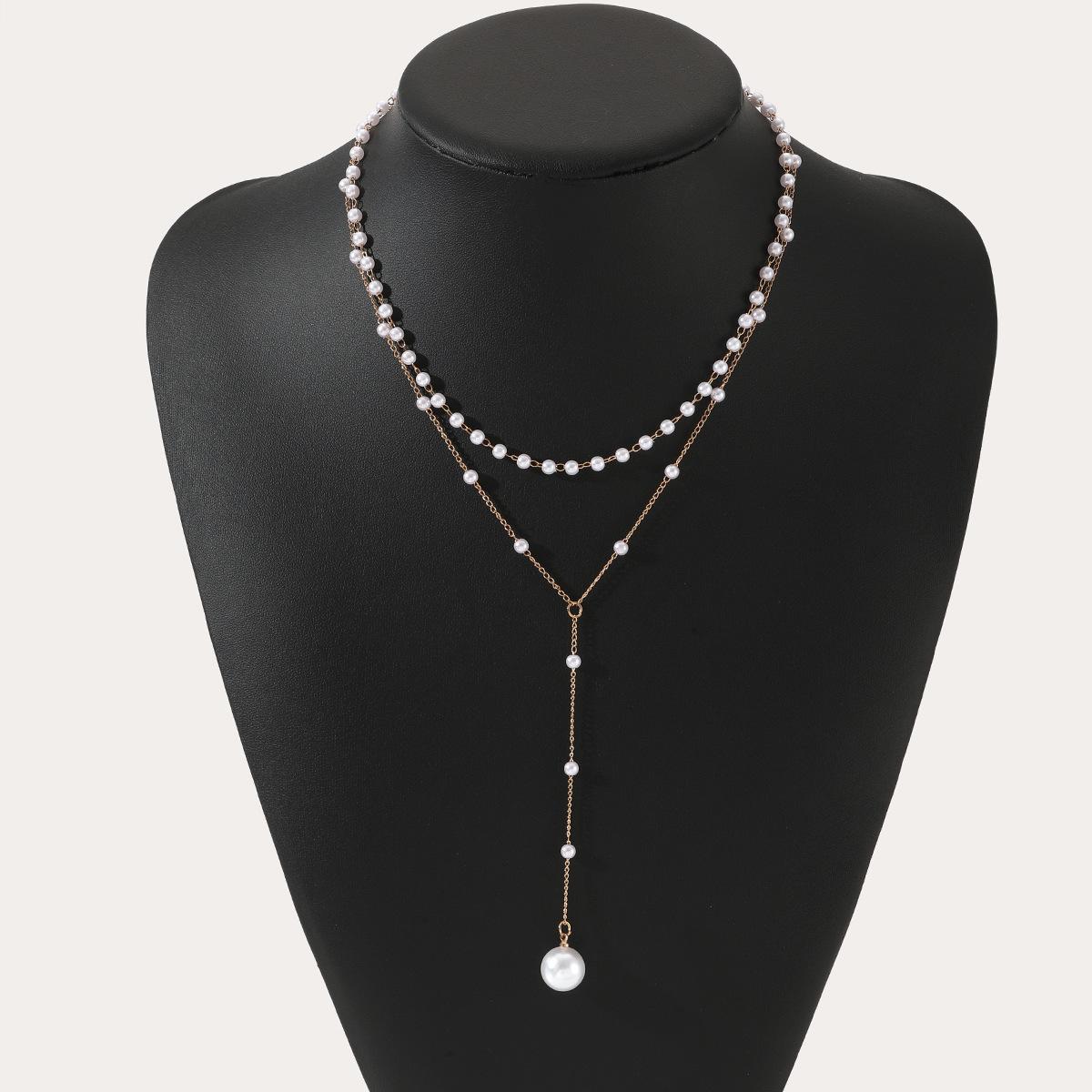 

Europe, America, fashion double-layer pearl necklace, personalized Y-shaped pearl tassel stacked collarbone chain necklace