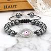 Adjustable Casual Beaded Glass Bracelet with a Woven Evil Eye Design