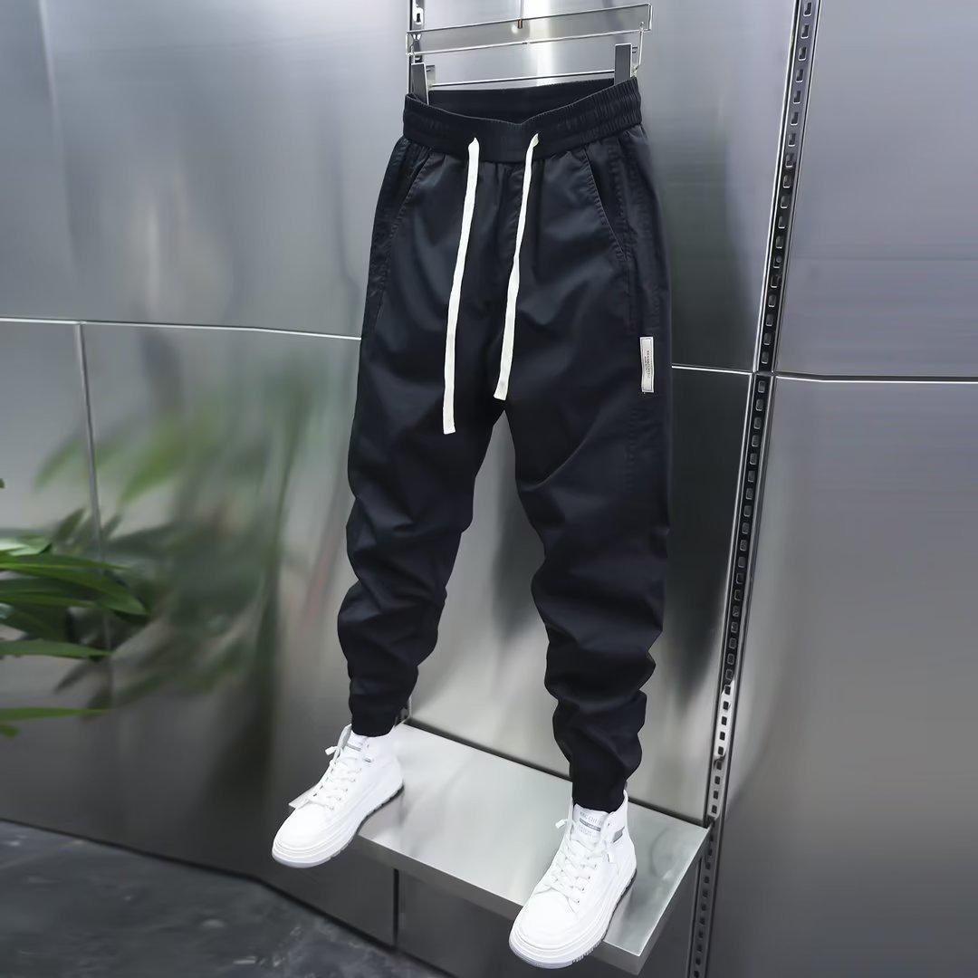 

Осень 2023 г. Мужские облегающие корейские шаровары с эластичными манжетами XL чёрный