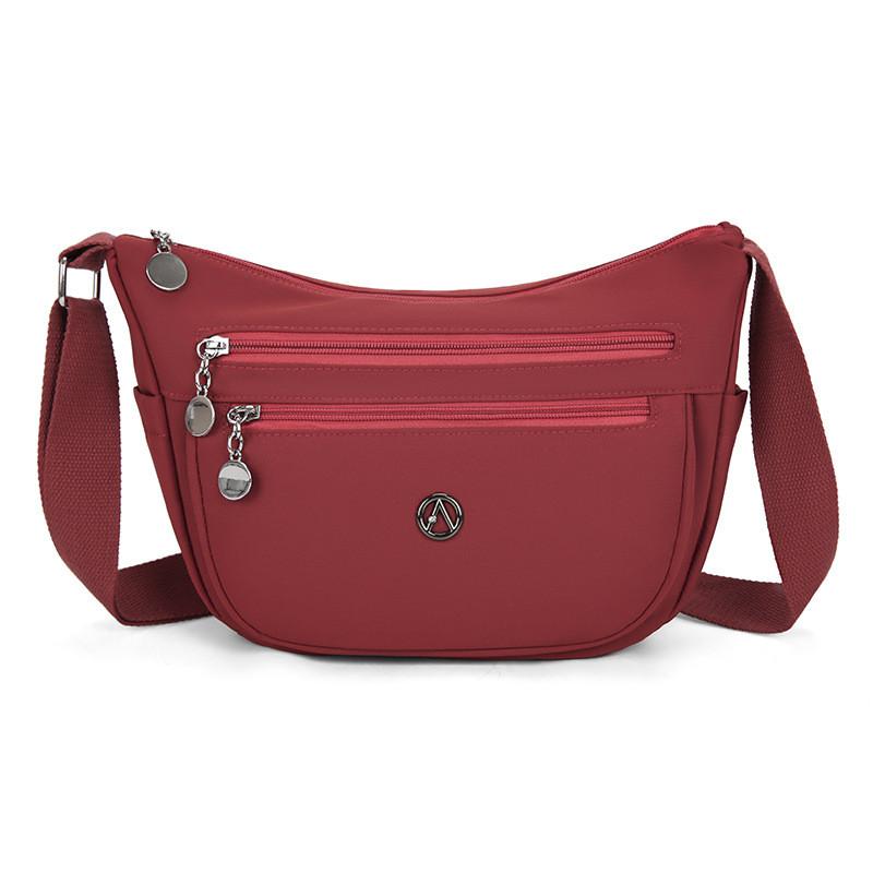 Stylish Nylon Crossbody Bag With Sewn Details And Inner Pocket For Casual Outings
