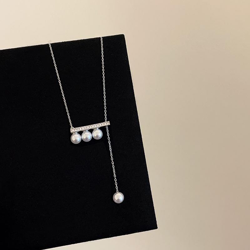 

Ожерелье с подвеской-подтяжкой из жемчуга и тигрового глаза, женская легкая роскошная ретро-элегантная модная универсальная цепочка на шею, цепочка на свитер