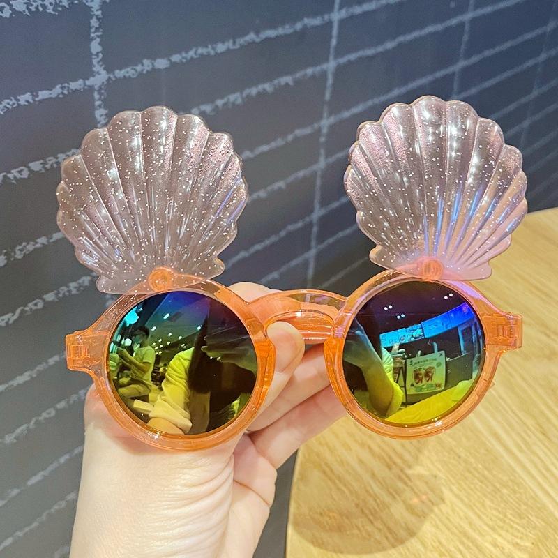 

Children s sunglasses UV protection cute baby shell flip glasses personalized boys and girls sunglasses summer sun protection помаранчевий