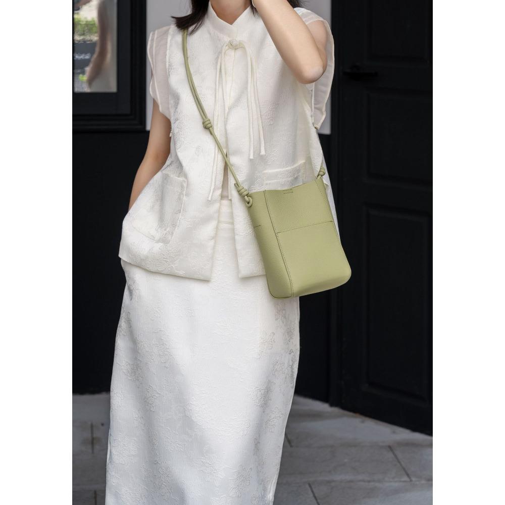New Top Layer Cowhide Leather Lightweight and Simple Tote Bag for Women Versatile Bucket Crossbody Bag Knot Adjustable Shoulder Bag