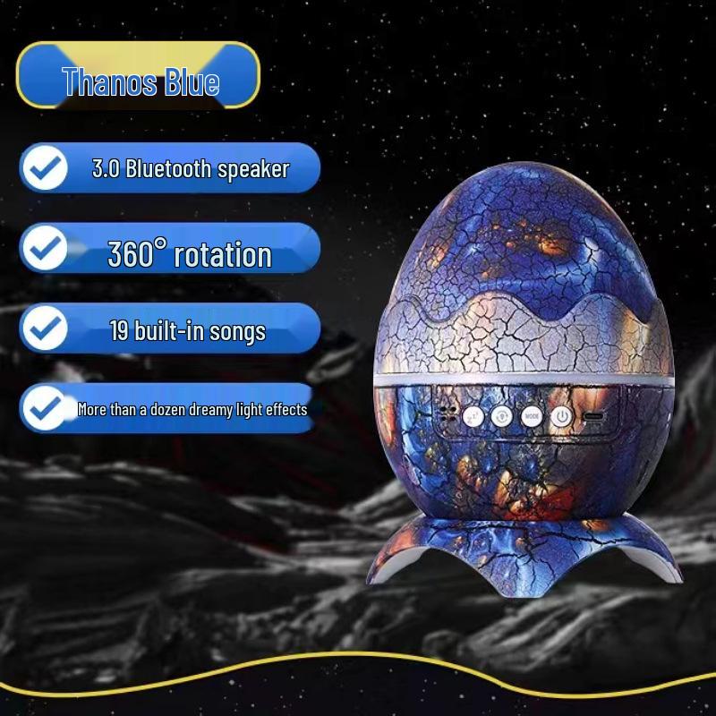 Dinosaur Egg Table Lamp and Projector: Starry Sky and Nebula Light with Remote-Controlled Speaker for Nighttime Ambiance.
