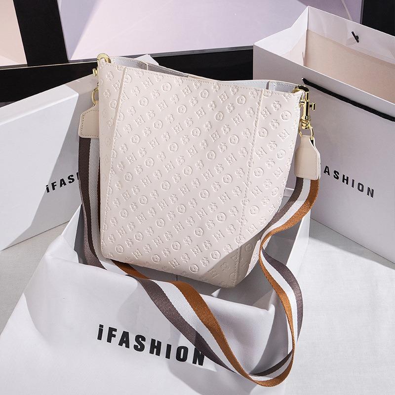 New Women's Bag Fashionable Versatile Embossed Solid Color Bucket Bag High-end Wide Shoulder Strap Commuter Shoulder Messenger Bag