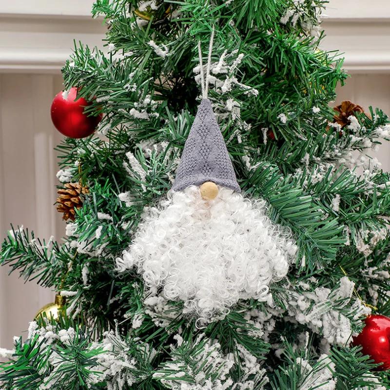 Weihnachtsbaumschmuck, Schneemänner, gesichtsloser Weihnachtsmann, Zuckerstangen, bunte Kugeln, kleine Häuser, Weihnachtsdeko