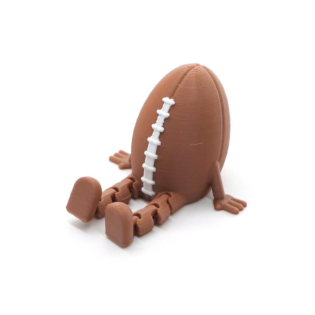 Sports-themed Seated Miniature Figures Of Various Spheres