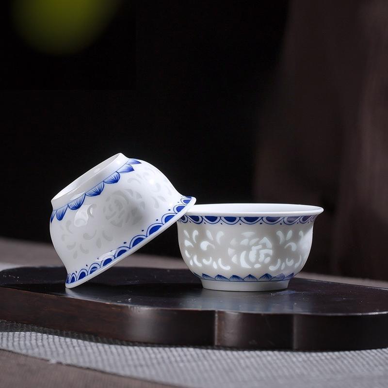 Hand drawn blue and white exquisite tea cup hollowed out ceramic Kung Fu single cup tea set teacup