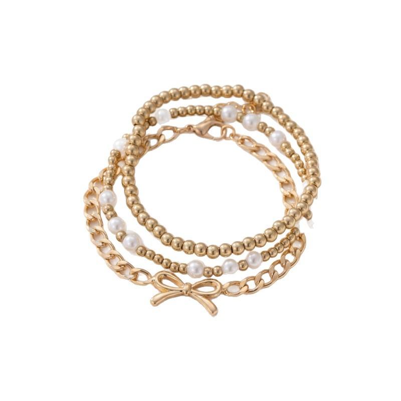 European and American simple bow pendant bracelet, fashionable and versatile imitation pearl star stacked hand jewelry women