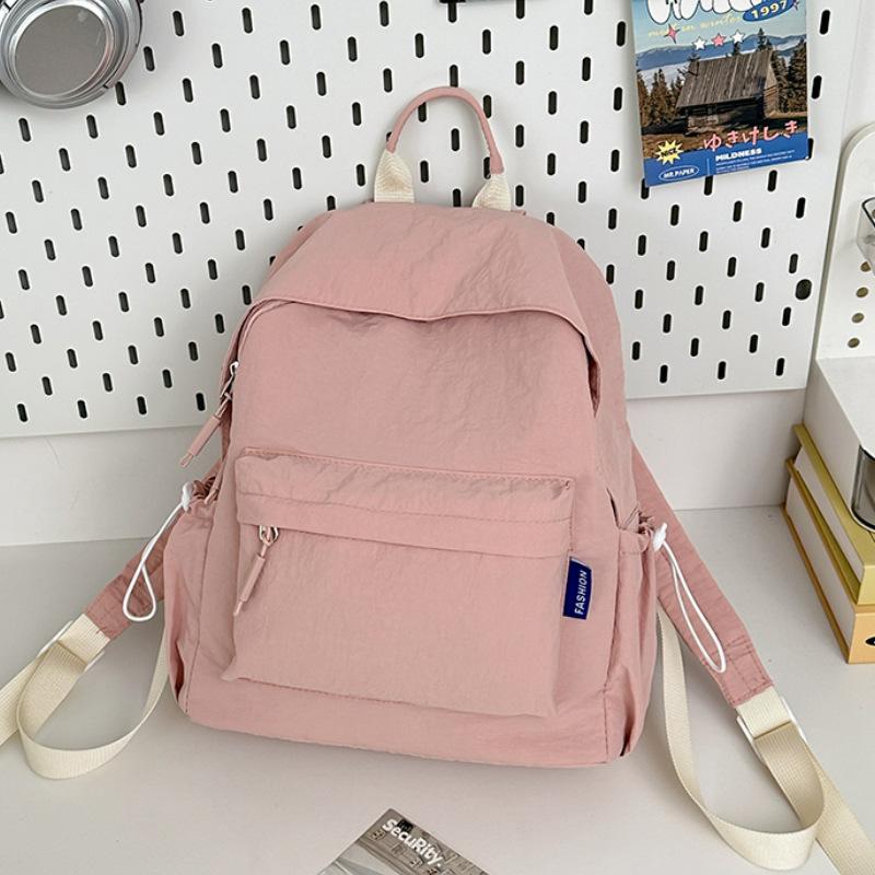 Simple Japanese backpack women 2025 new casual ins wind backpack junior high school student schoolbag