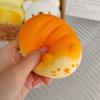 Simulated bread soft and slow-rebounding toy stress relief gadget, "Squeezzy Joy", a cute stress-reducing toy.