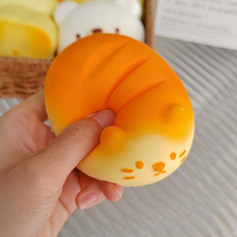 Simulated bread soft and slow-rebounding toy stress relief gadget, "Squeezzy Joy", a cute stress-reducing toy.