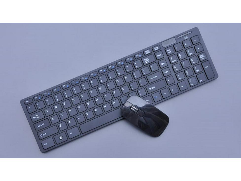 Ultra-Thin K06 Wireless Keyboard and Mouse Set with Keyboard Cover for Home and Office.