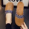 Linen slippers summer breathable rattan straw mat woven flat bottom men's and women's spring and autumn European indoor cool slippers small daisies