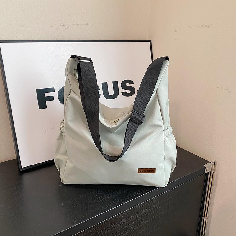 

New canvas bag, new trendy and fashionable personalized one-shoulder oblique span bag, large-capacity messenger bag. large