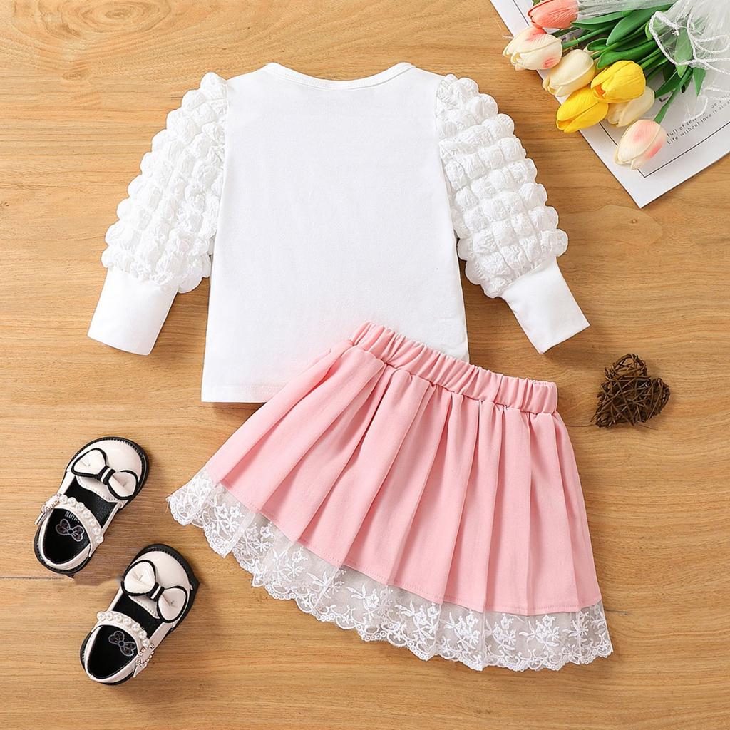 Stilig kjolesett med lange ermer