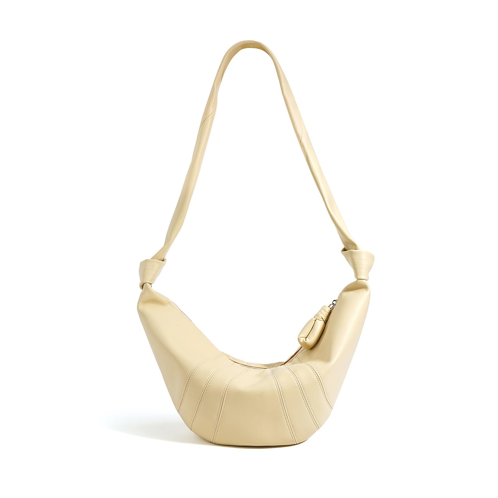 

Круассан 2025 новая нишевая текстурная кожа для поездок на работу большая вместимость на плечо кроссбоди поясная сумка сумка-пельмень сумка-круассан