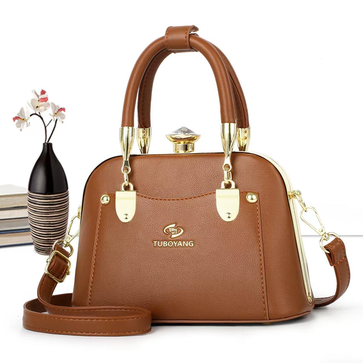 2026 New Women s Light Luxury Large Capacity Clip Handheld Shoulder Bag Versatile Commuting Women s Bag