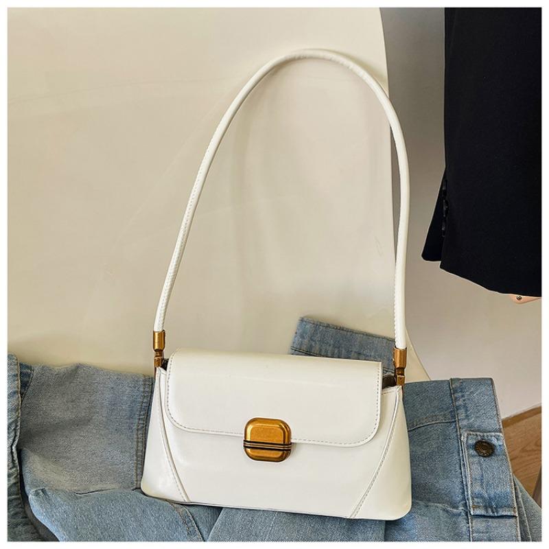 Design sense niche bag women's new high-end texture underarm baguette bag versatile shoulder bag
