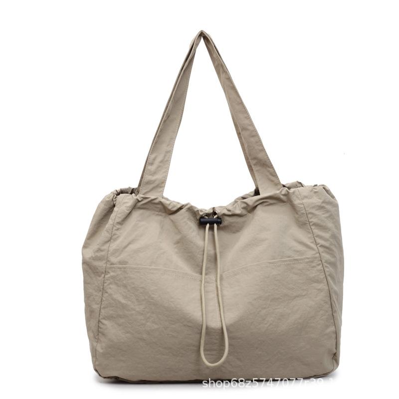 2025 New Solid Color Large Capacity Niche Design Fashionable Versatile Shoulder Bag Handbag Student Class Tote Bag