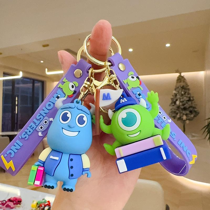 Klíčenka s tématem Anime Monsters, Inc Módní silikonové panenky Přívěsek na tašku Příslušenství ke klíčům od auta Malé dárky pro studenty
