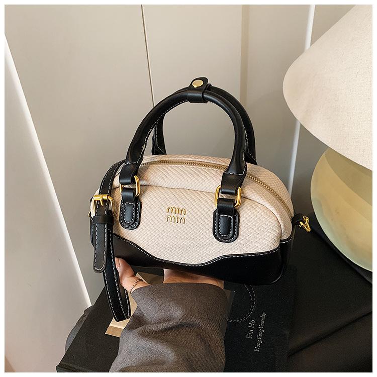 Kuddeväska vår ny mångsidig dam liten väska nischdesign axelväska avslappnad sned väska