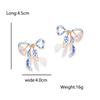 2pcs Fashionable and Elegant Bow-Shaped Earrings with a Simple Blue and White Porcelain Pattern Design.