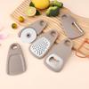 Multifunctional 5-in-1 Portable Kitchen Gadget Peeler Bottle Opener Garlic Grinder Cheese Grater