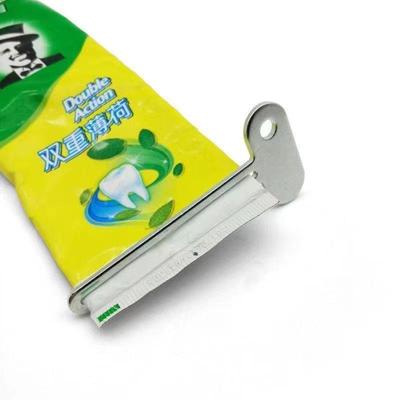 Spremi dentifricio Porta dentifricio Cura orale Attrezzi per il bagno Tubo Cosmetici Pressa Detergente per il viso Dispenser rotante per spremitura