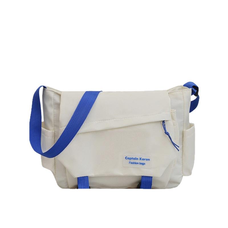 Large capacity tooling multi-pocket messenger bag leisure student shoulder versatile messenger bag solid color anti-splashing women's bag