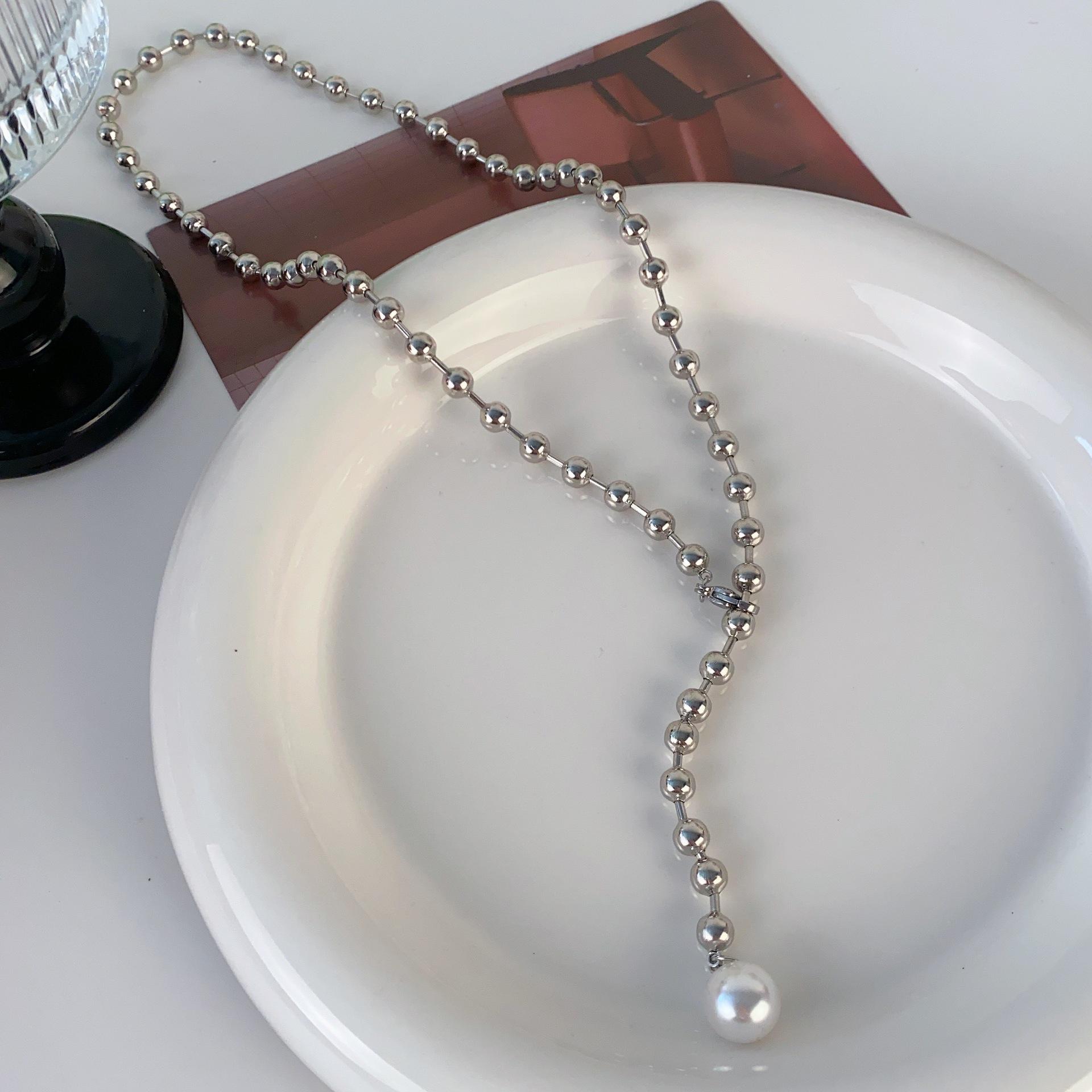 

Japan and South Korea s new niche high-end metal ball pearl pendant necklace women s sweater chain exquisite neck chain accessories women