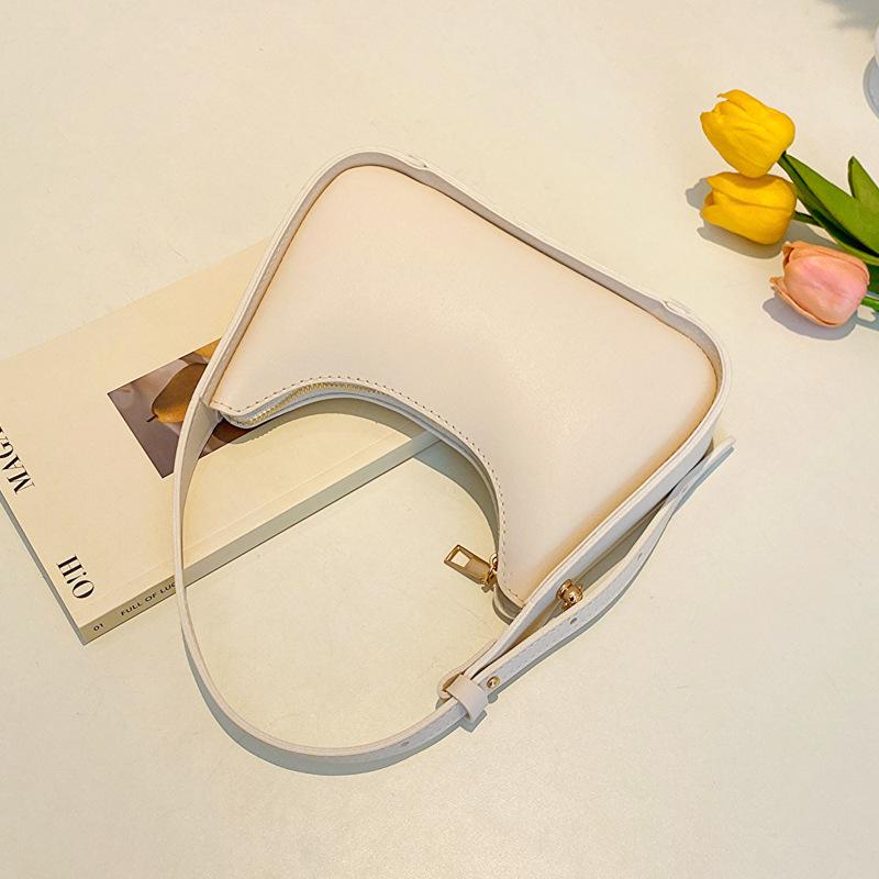 Премиальная текстура нишевая сумка женская 2025 новая летняя универсальная популярная французская однотонная сумка на плечо подмышку в этом году