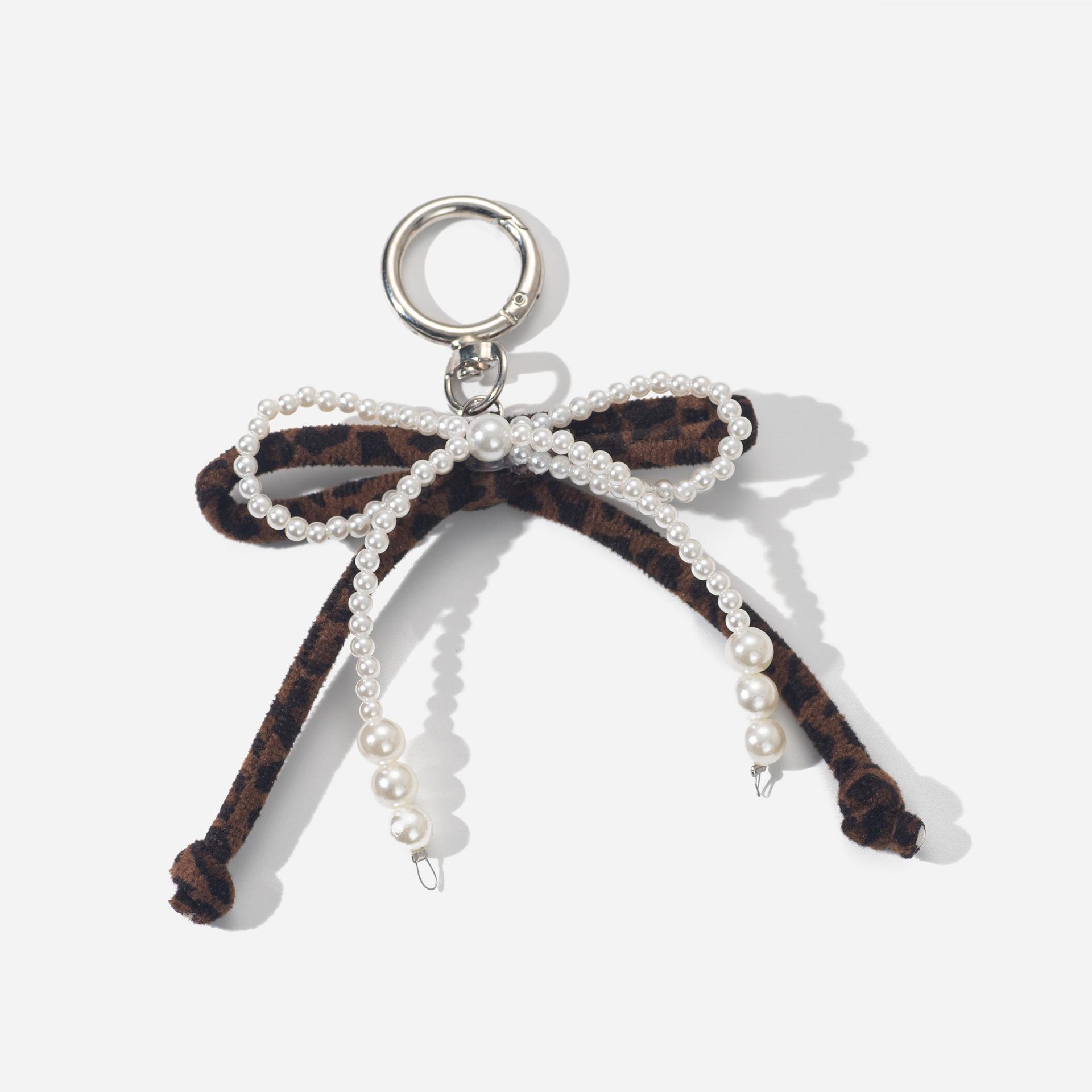 

Vintage-Style Leopard Bow Keychain with Faux Pearls