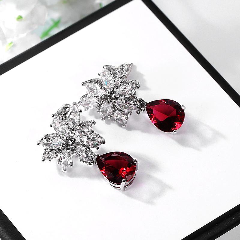 

Huitan Elegant Women s Drop Earrings for Dance Party Crystal Red CZ Pendent Wedding Anniversary Female Earring Fashion Zircon