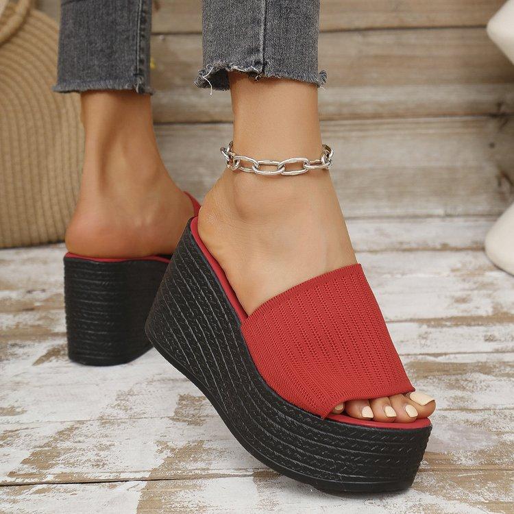 2025 summer new large size solid color wedge heel one-word slippers women wear thick-soled knitted mesh wedge heel cool slippers