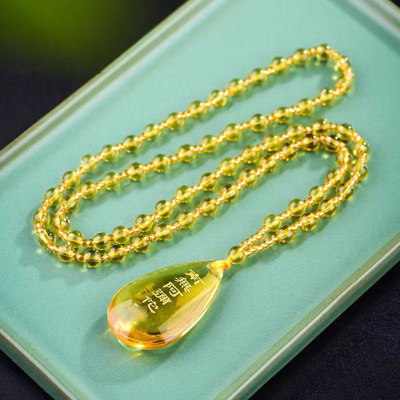 

Auspicious Yellow Namo Amitabha Water Drop Glass Pendant - Unisex Gift