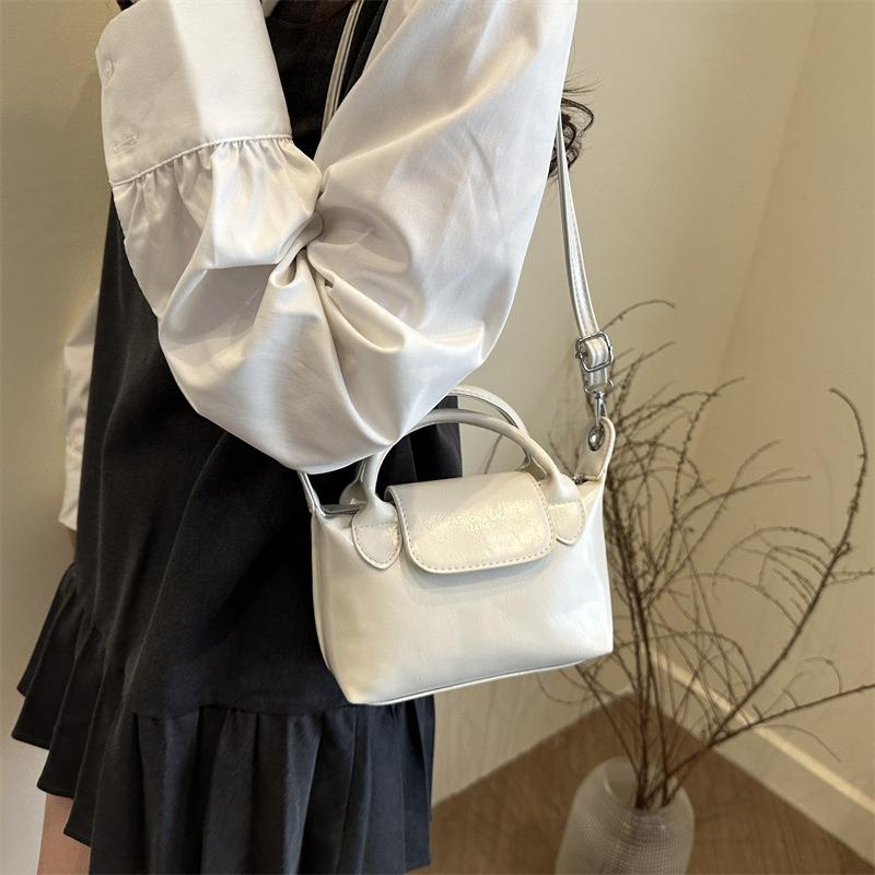 Spring and summer retro portable small square bag popular niche design women's bag versatile single shoulder diagonal span dumpling bag