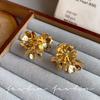 European and American light luxury high-end metal flower earrings, beautiful temperament exaggerated unique design retro high-end stud earrings