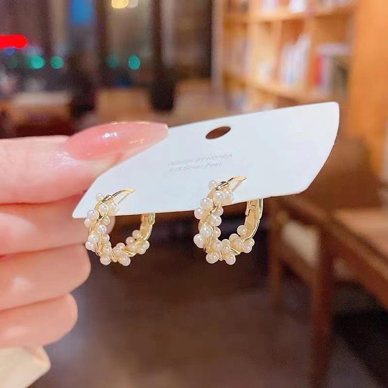 A Minimalist and Elegant Round Pearl Earring Suitable for Women. Fashionable Small Earrings and Jewelry