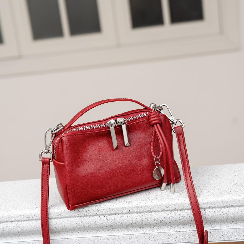Cross-border new bags, first-layer cowhide women's bags, casual fashion handbags, commuter messenger bags, versatile shoulder bags.