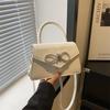 Simple and popular versatile solid color bow sewing line women's bag fashionable oblique span shoulder handbag