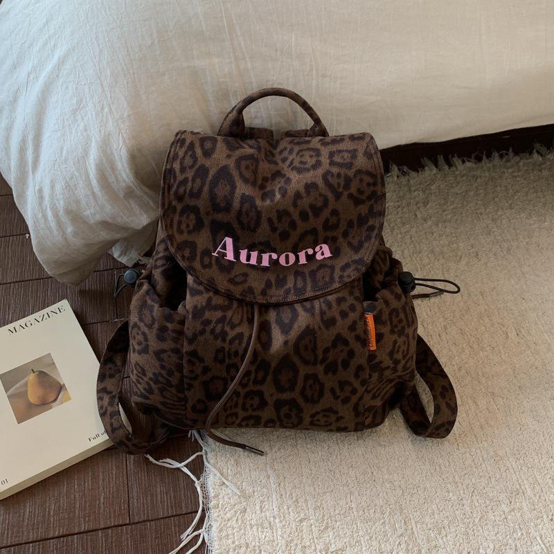 

2025 autumn new trendy niche retro leopard print canvas backpack women s high-value pumping belt large-capacity backpack коричневый