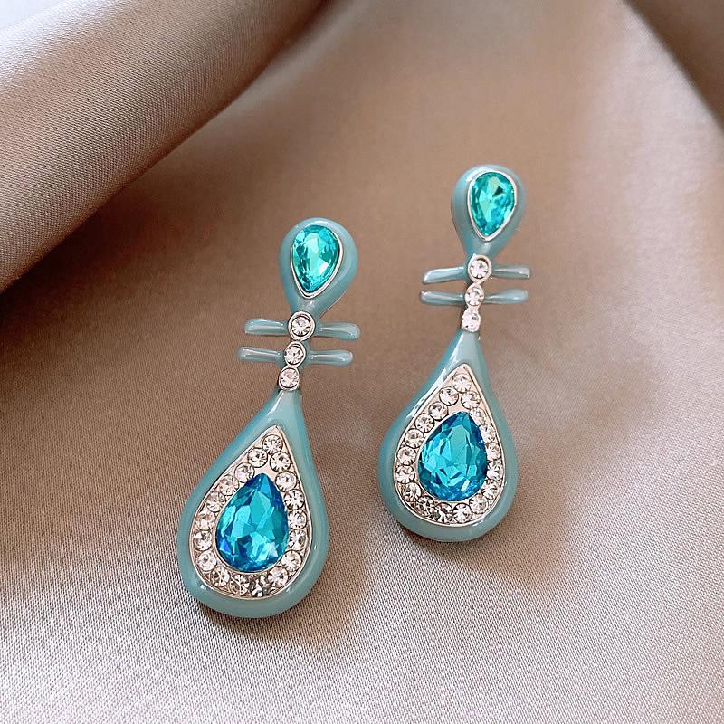 Raffinati Orecchini a Bottone Quadrifoglio Turchese e Cristallo - Elegante Design Geometrico di Alta Gamma per Donna