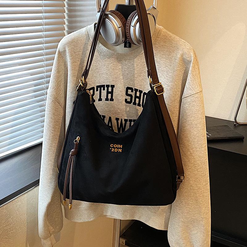 Lässige Pendler-Tragetasche Damen große Kapazität 2025 neue Schulter-Umhängetasche Retro-Mode leichter Rucksack