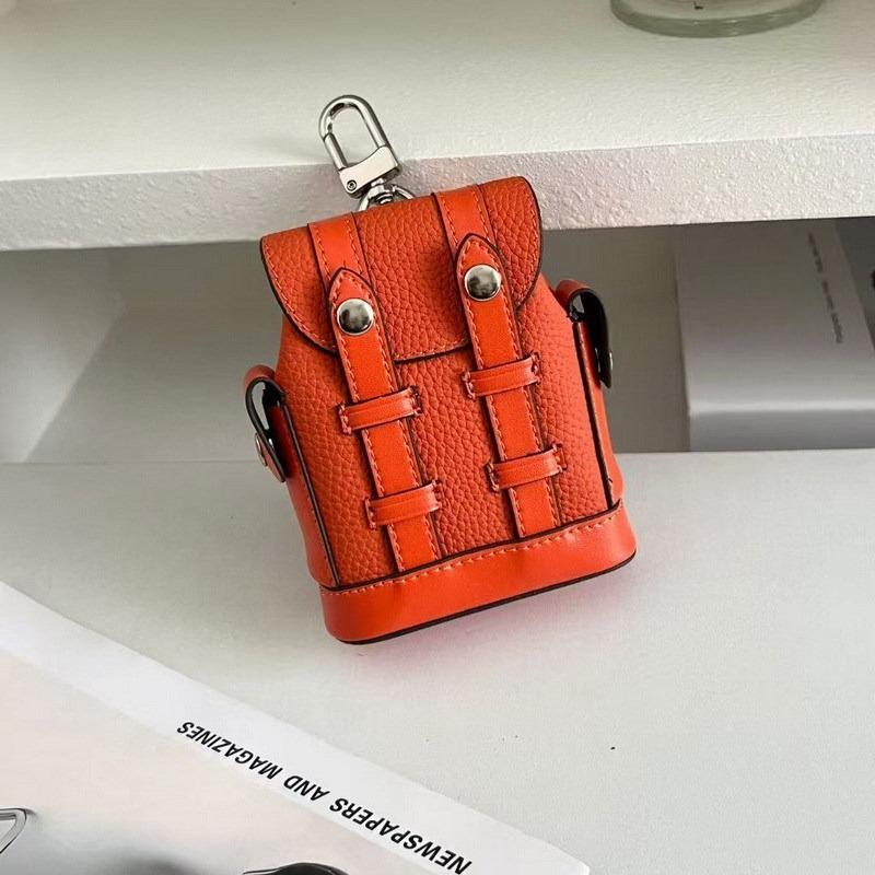 New small shoulder back bag pendant mini high value earphone keychain pendant оранжевый