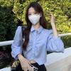 Short shirt women's white shirt women's spring and autumn new Korean version design pleated college style age-reducing pure desire top