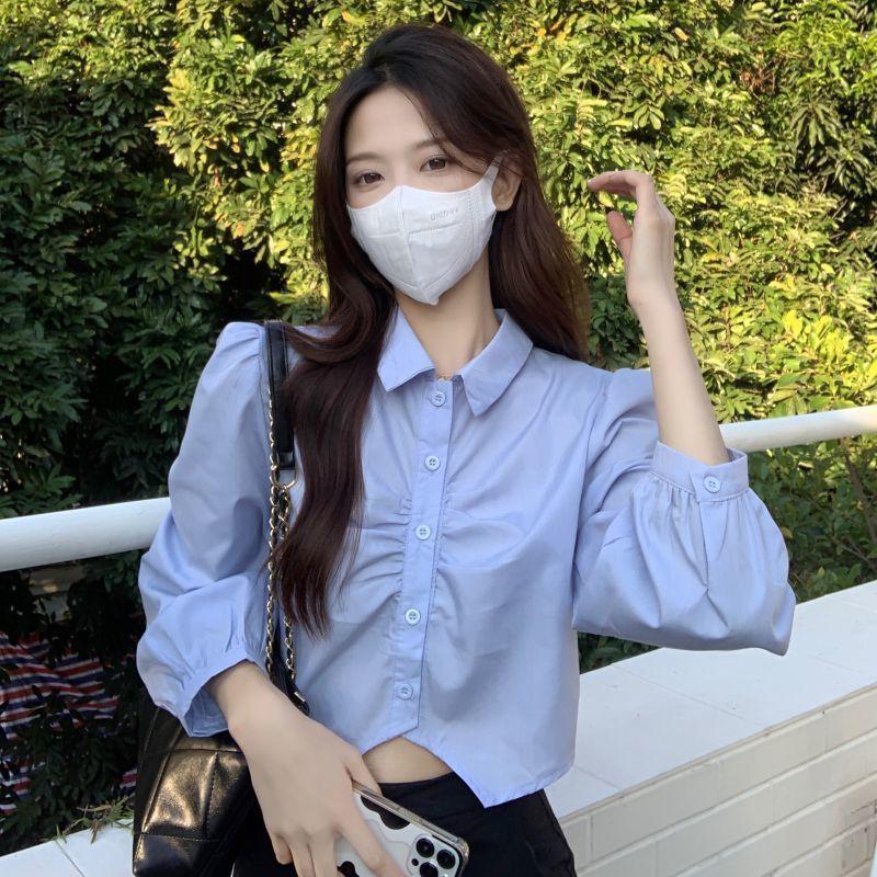 Short shirt women's white shirt women's spring and autumn new Korean version design pleated college style age-reducing pure desire top