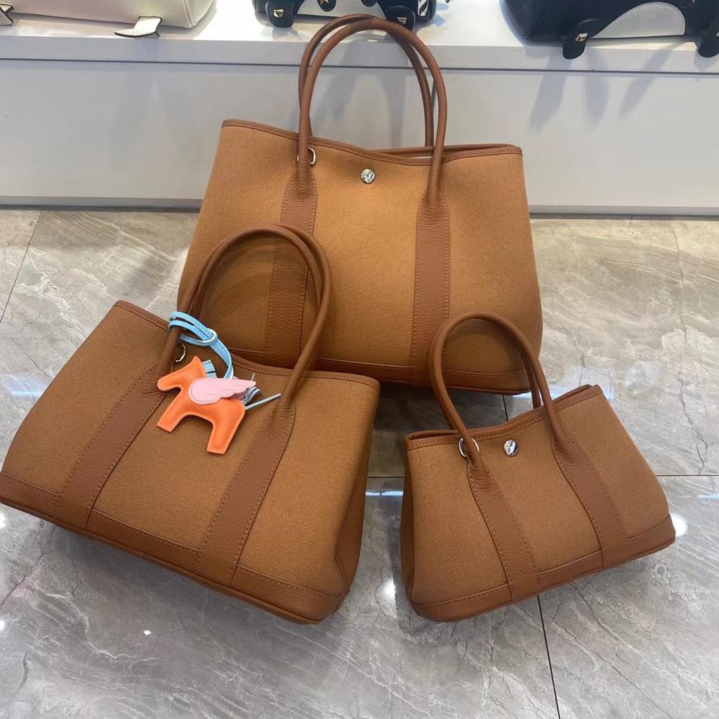 Grensoverschrijdende nieuwe canvas tas met eerste laag koeienhuid voor dames, tuin handtas, echt leer, contrasterende kleur, schoudertas, messenger tas, tote bag