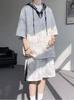 Men's Patchwork Plaid Two-Piece Set: Hooded Short-Sleeve Top & Five-Point Pants